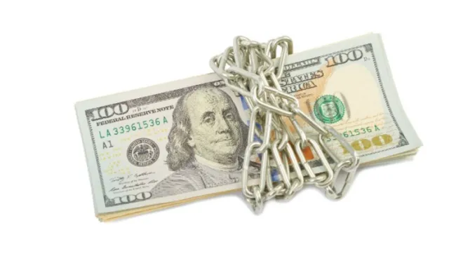 dollar bills with chain and lock